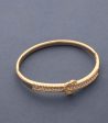 Dangling Golden Color Brass Bracelet (Brass) on Sale